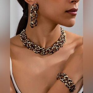 Three piece leopard print necklace set.